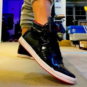 Women’s Adidas black patent leather sneakers